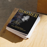 boomer magazine on a wooden table